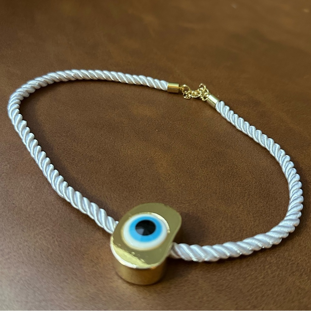 evil eye on gold pendant on white soft rope necklace - Picture 5 of 5